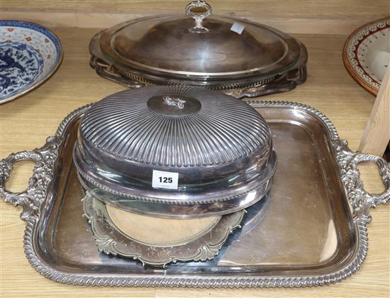 A Victorian silver plated two handled tea tray, a plated cover, two coaster frames, etc.